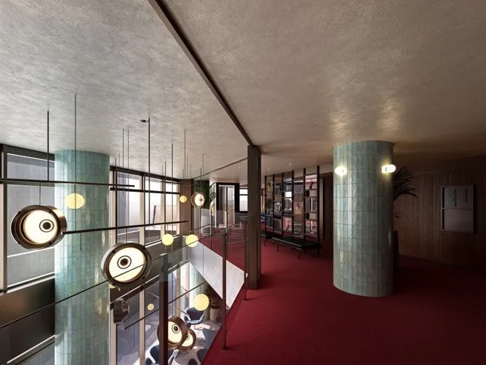 赤い絨毯と青いタイルが映える2階の文化交流ラウンジ