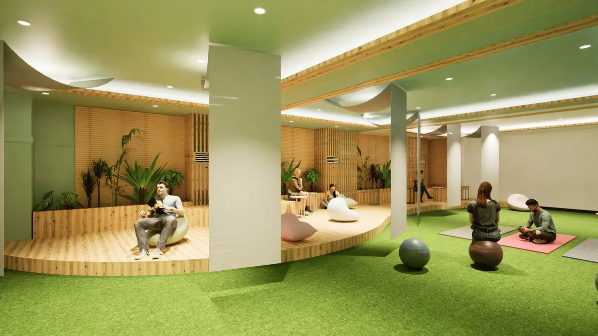 人工芝が敷かれ、ビーズクッションでリラックスできる屋内プレイスペース