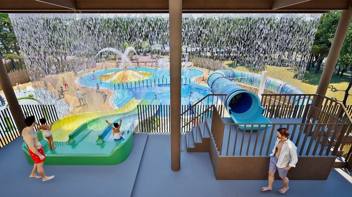 水のカーテンをくぐり抜けるような迫力あるスライダーの様子。