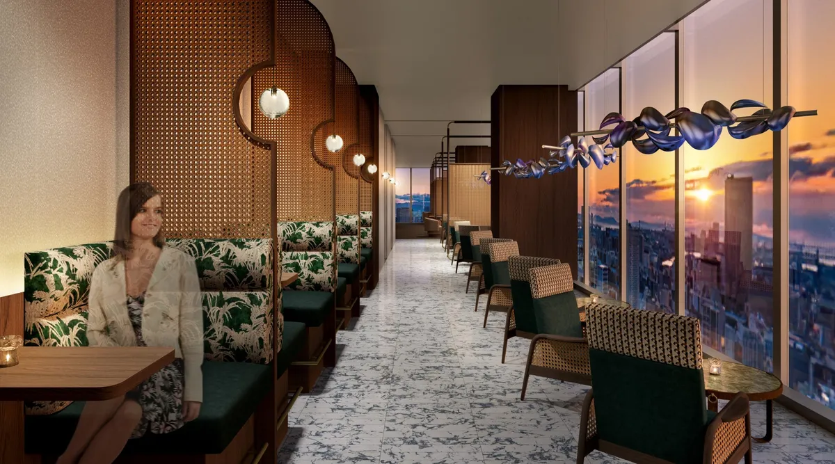 ボタニカル柄のソファが印象的なラウンジエリア