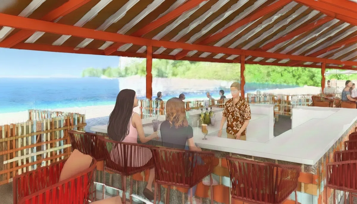 ビーチハウス内のバーカウンター。温かみのある木材と鮮やかなタイルが調和したモダンな空間。